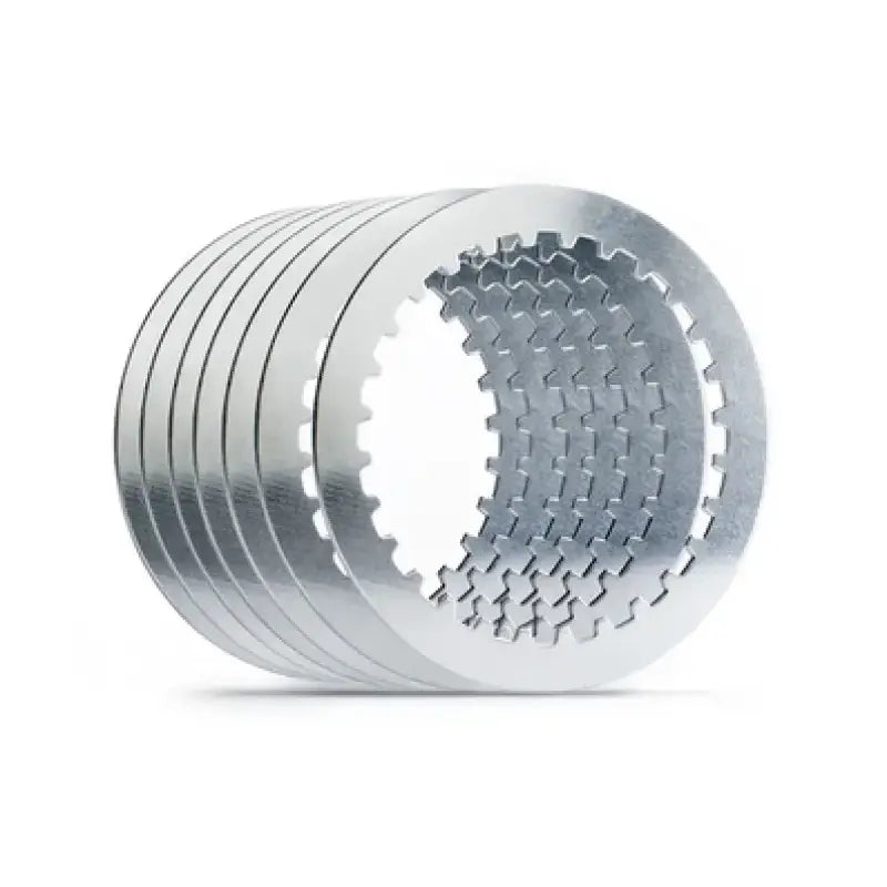Stack of seven silver Hinson clutch plates with gear teeth for clutch basket durability