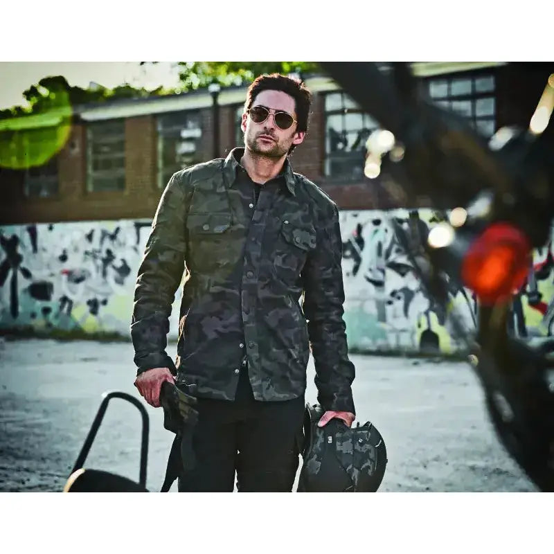 Man in camouflage arms moto shirt showcasing Speed and Strength Call to Arms Moto Shirt Small