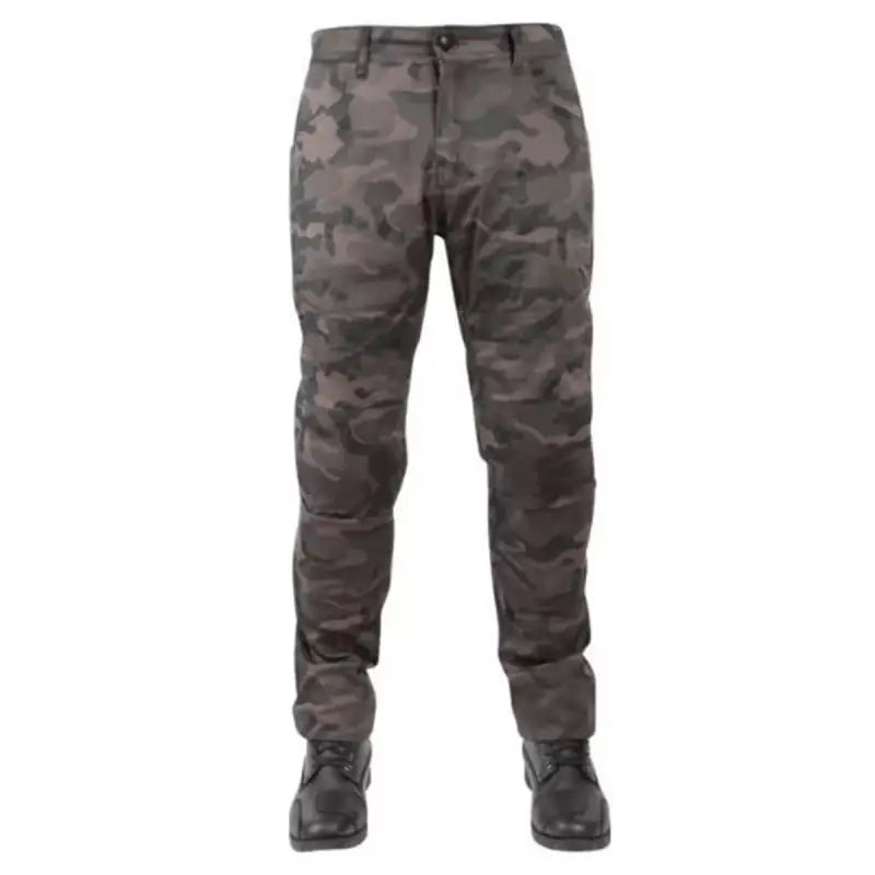 Speed and Strength Dogs of War Pant Camouflage with black boots for a tough look