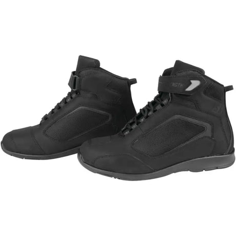 Pair of black speed and strength moment truth leather shoes motorcycle boots