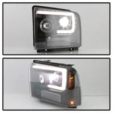 Black projector LED headlights with daytime running lights and amber turn signals for Super Duty trucks