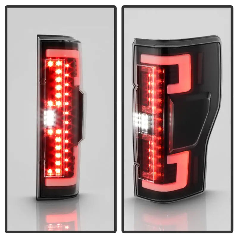 Black LED tail lights with red and white illumination for Ford F250 SD trucks