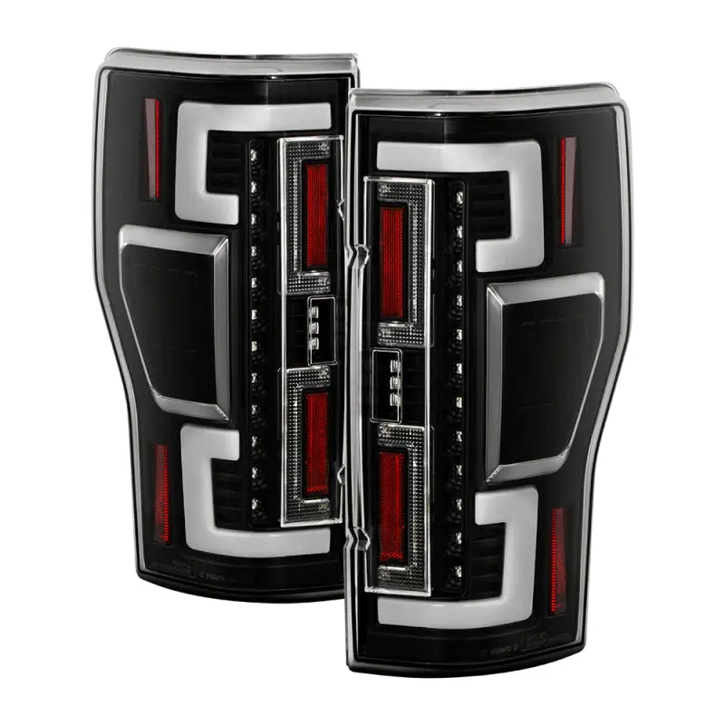 Black and chrome LED tail lights with red and white accents for Ford F250 SD