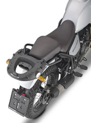 Rear view of white motorcycle with matte black luggage mounting hardware and grab handles