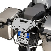 Rear view of motorcycle with matte black hard luggage mounting hardware and side cases