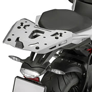 Silver motorcycle luggage rack for hard luggage mounting above rear wheel, OEM hardware