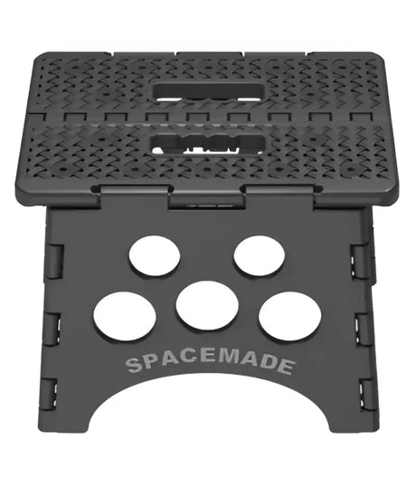 SS-9 Big Ant Folding Step Stool 9In by Spacemade, compact design, black, sturdy construction, non-slip surface, foldable for easy storage, supports up to 300 pounds.