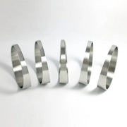 Five stainless bros silver metal rings with tight radius pie cut design