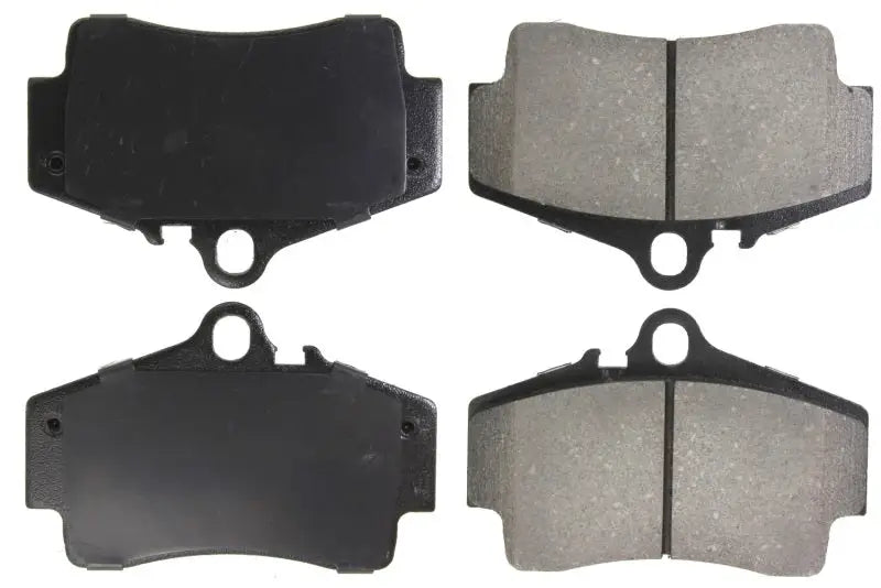 Four StopTech Performance rear brake pads for Porsche Boxster and 911 models