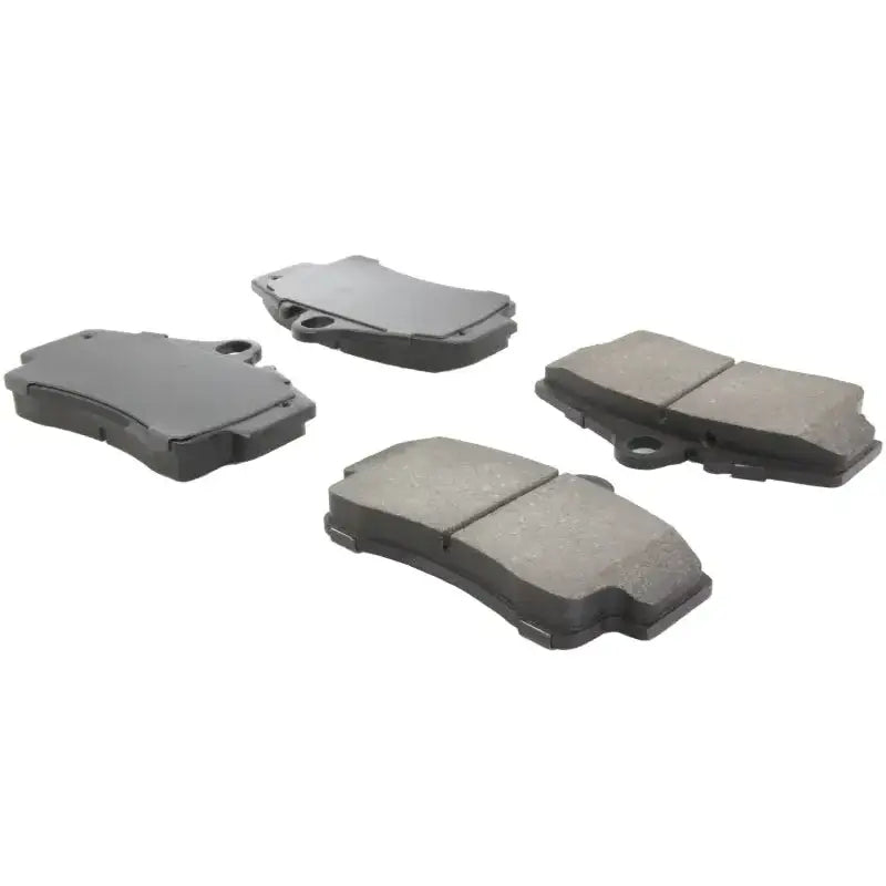Four StopTech Performance rear brake pads for Porsche Boxster and 911 models