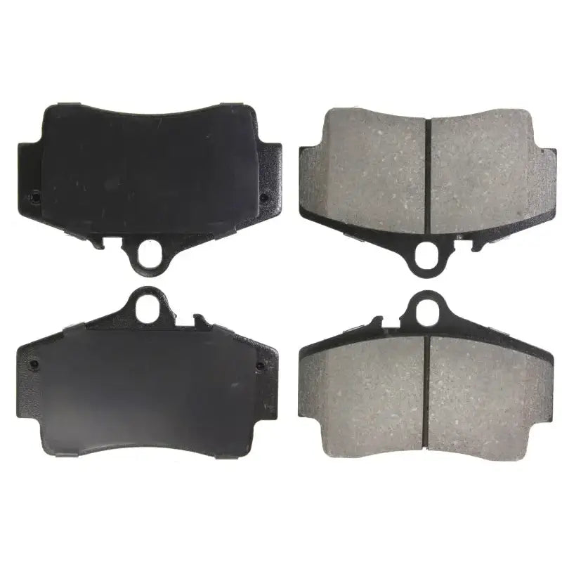 Four StopTech Performance rear brake pads for Porsche Boxster and 911 models