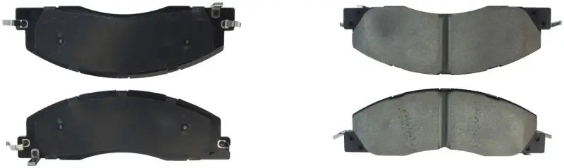Four StopTech Sport Brake Pads with shims and hardware for rear brake upgrade