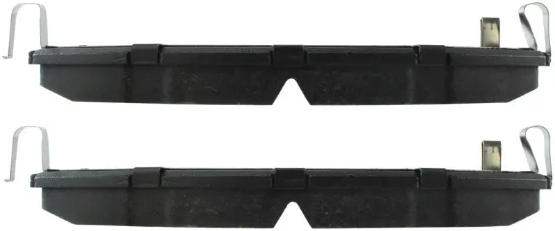 Dark-colored StopTech Sport Brake Pads with shims and hardware for rear brake upgrade