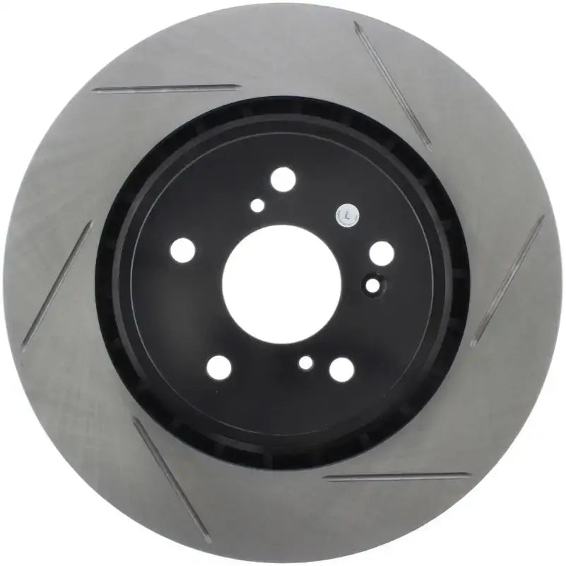 StopTech Sport Slotted Rotor front left with slotted and drilled design for better brake performance