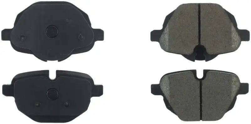 Four StopTech Street Brake Pads showing backing plates and friction material for rear brake upgrade