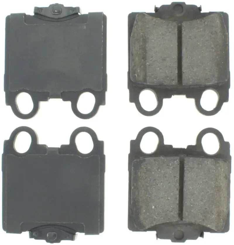 Four StopTech Street Select brake pads for front and rear braking performance