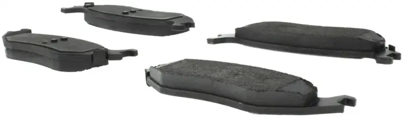 Four black StopTech Street Select brake pads for front street select brake system