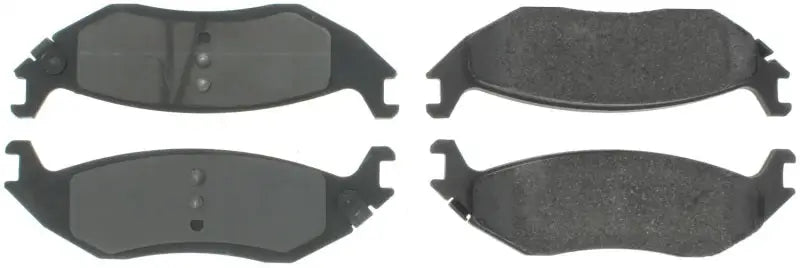 Four black StopTech Street Select brake pads for front brake upgrade