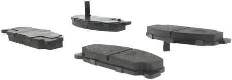 Four black brake pads for improved braking performance with StopTech Street Select