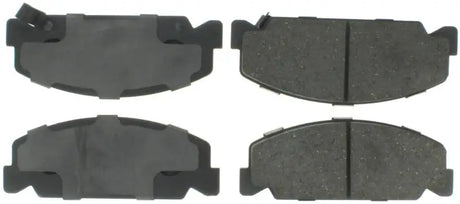Four StopTech Street Select rear brake pads for improved braking performance