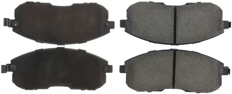 Four StopTech Street Select Brake Pads for rear brake replacement
