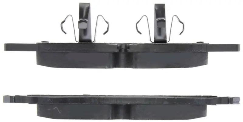 Two StopTech Street Touring rear brake pads with clips for Subaru Legacy and BRZ