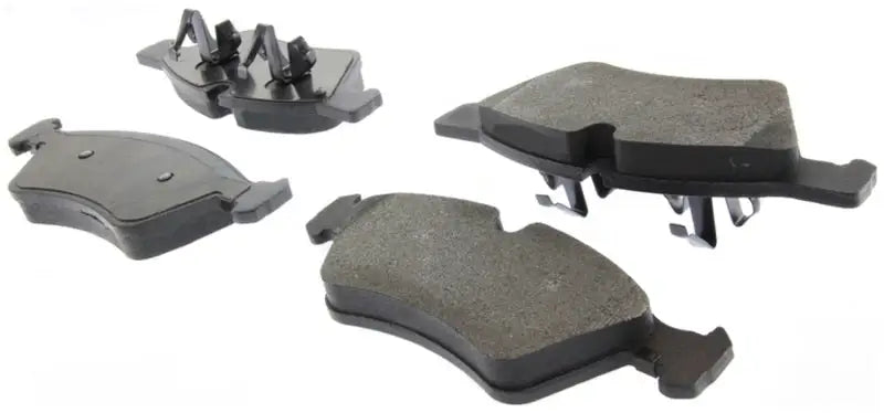 Four black StopTech Street Touring rear brake pads for Subaru Legacy BRZ Outback