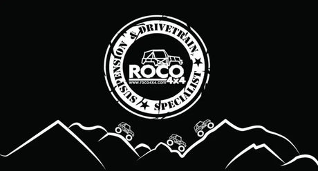 Logo for off-road suspension and drivetrain shop with stylized vehicle, mountains, clutch kit