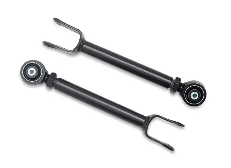 SuperPro Jeep Wrangler TJ upper trailing arm set with black metal stabilizer bar, rubber bushings, and fork ends