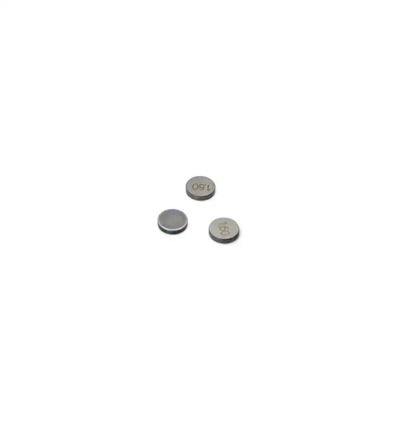 Three small metallic shims showing the Supertech 8mm shim 3.30mm thick