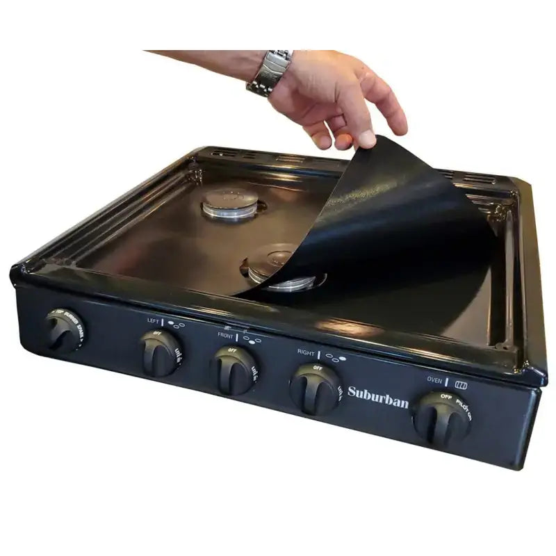 SWRV400 Stove Wrap Stove Top Protectors Suburban being placed on a stove to keep it clean and scratch-free.