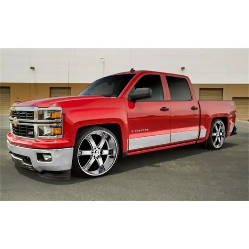 Red Chevrolet Silverado with chrome wheels showcasing T2189-304M Ici Stainles Rocker Panels