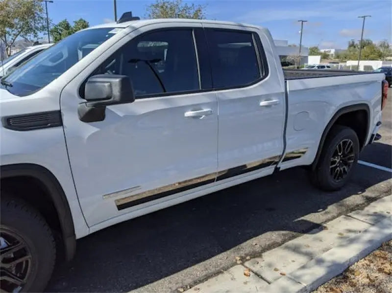 White pickup truck with T2402-304M Ici Stainles Rocker Panel Molding