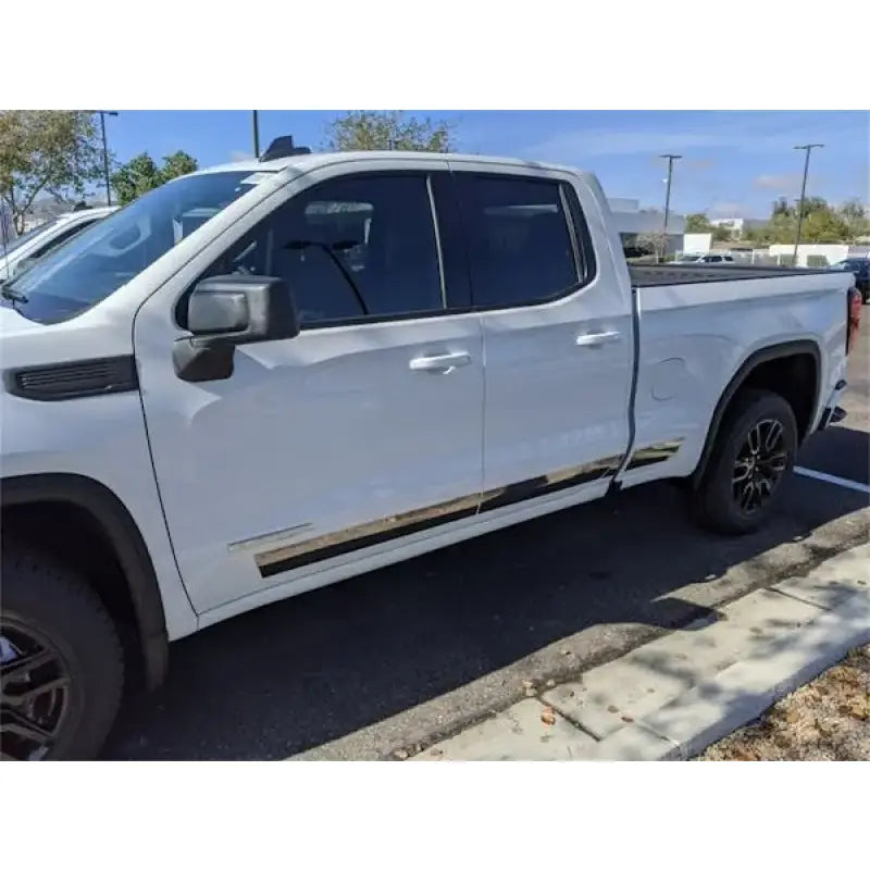 White pickup truck with T2402-304M Ici Stainles Rocker Panel Molding