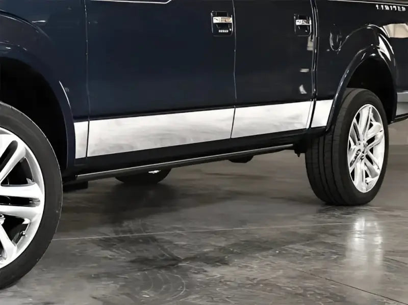 Dark blue Ford F-150 with chrome door trim and running boards showcasing ici stainles rocker panels