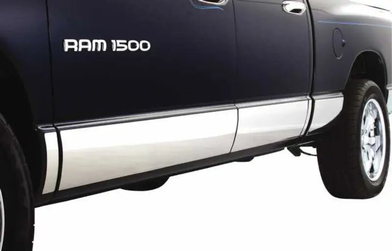 Side view of dark blue Dodge Ram 1500 with chrome rocker panels and ici stainles rocker