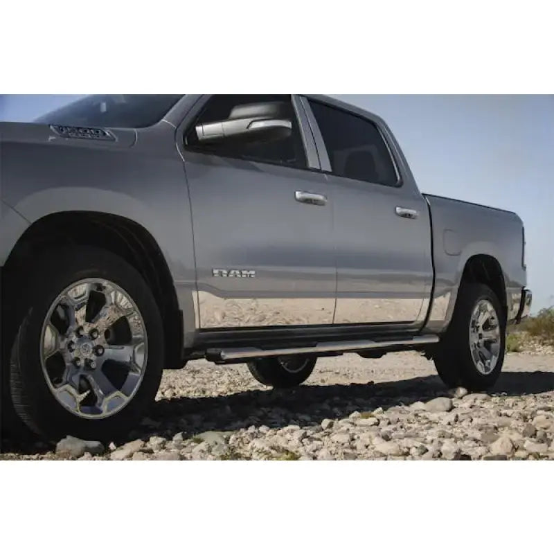 Silver four-door pickup truck with chrome accents and rocker panels for T3058-304M Ici Stainles Rocker Panels