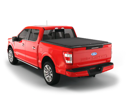 Red Ford F-150 pickup truck with tonneau cover.