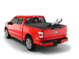 Red Ford F-150 with sawtooth tonn cvr bed cover for Raptor 21-22F-150 trucks