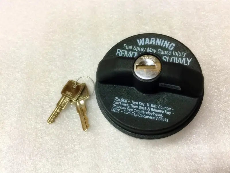 Black Titan Fuel Tanks locking fuel cap with keys for secure fuel access