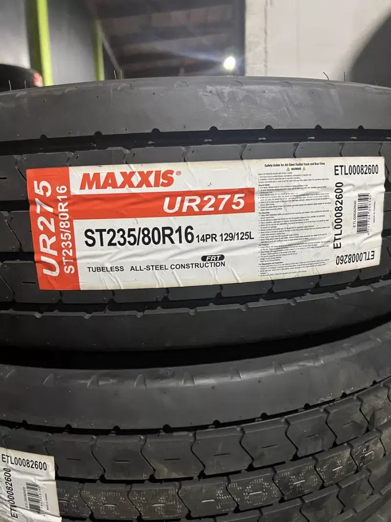 TL00082600 Maxxis Tire ST235/80R16 14PR TL UR-275 black with red/white text