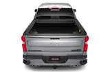 Silver pickup truck with matte black tonneau cover power retractable and lockable