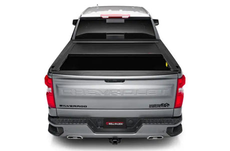 Silver pickup truck with matte black tonneau cover power retractable and lockable