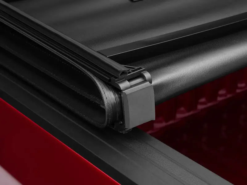 Black carbon fiber Tonno Pro tonneau cover for Toyota Tundra 6ft 7in bed