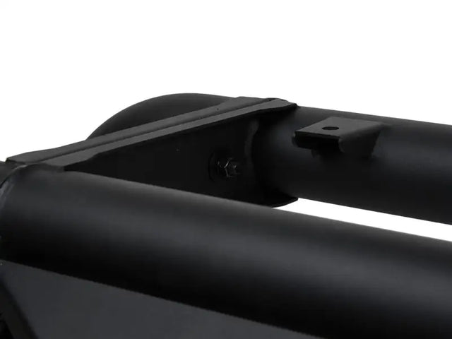 Black metal truck bed bar with 3 inch tubular frame and third brake light mount