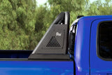 Blue pickup truck with black bed bar and roll bar mounted on open channel bed rail