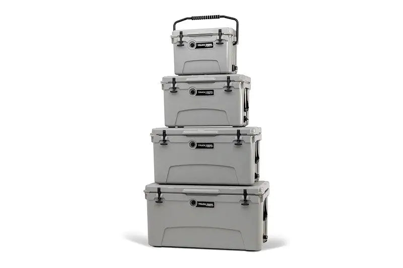 Four stackable gray truck gear cooler110 hard-sided coolers with latches and handles