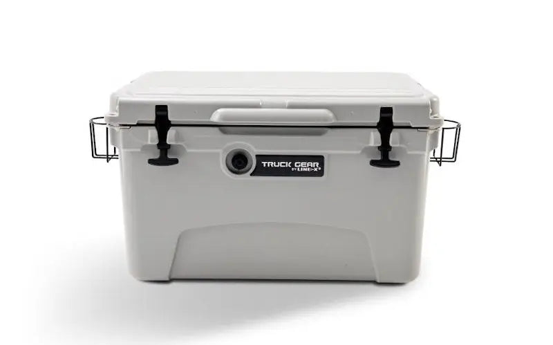 Light gray Truck Gear Cooler45 45 Qt with black latches and metal handles for adventures