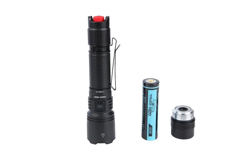 Black Truck Gear Hi-Pwr Flash Light with red button, pocket clip, battery, and spare part