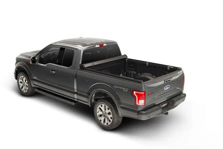 Gray Ford F-150 pickup truck with Truxport bed cover for the truck bed protection